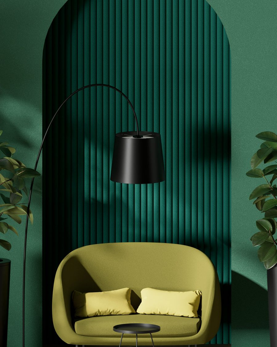 A styled interior corner with a fluted feature wall and a designer accent chair, illustrating a considered finish
